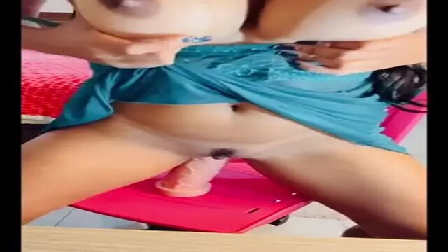 Naughty brunette struggles with her big tits