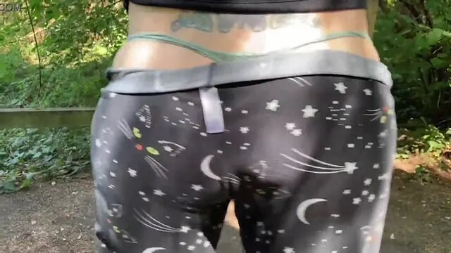 Naughty MILF in pajamas teases with a large dildo