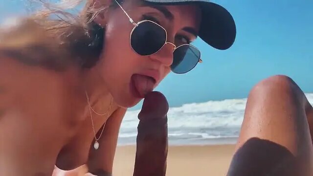 White Girl with Beautiful Face gives Blowjob on Nude Beach