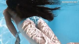 Pretty slut Lana shows off her swimwear in the nude