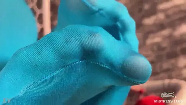 Mistress foot teasing you in hanging chair in white dirty socks and blue tights