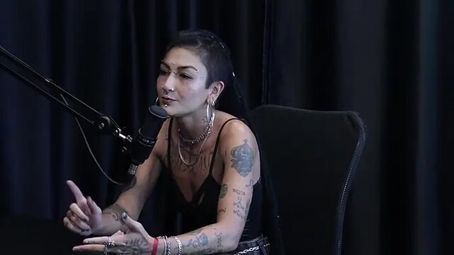 Redhead Caroleta Roots gets gangbanged by eight men with big dicks