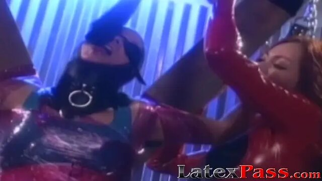 Vintage latex-suited dykes get tormented and whipped in the dungeon