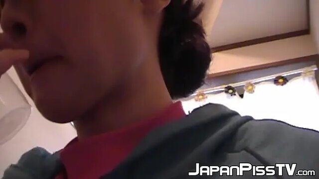 Adorable Japanese teen pees in a glass cup