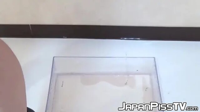 Japanese sweetheart pees through wet red panties