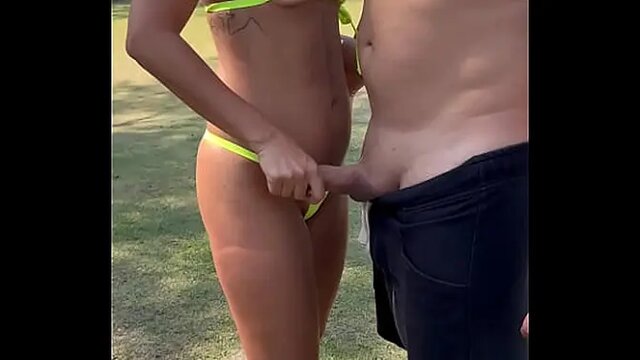 Brunette babe sucks big shaft in public parking lot