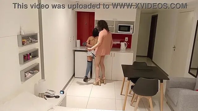 Busty Latina brunette sucks big cock in the kitchen