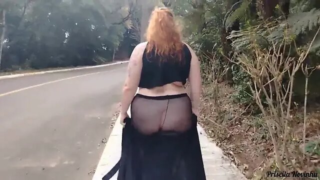 Barefoot and pantyless Priscila shows off her large natural tits on the street