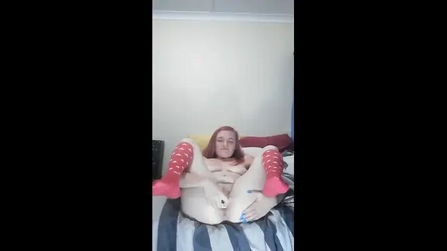 Late-night solo masturbation for a busty tattooed MILF