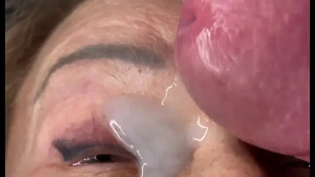 Mature MILF face-banged by a huge, uncut cock