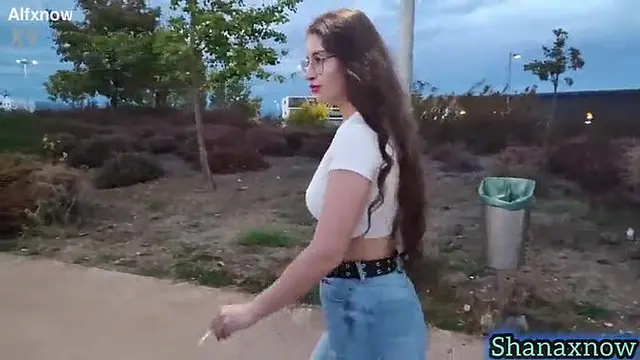 Brunette babe with a big booty shows off her round ass in tight jeans