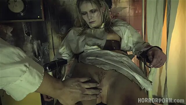 Blonde horror porn star gets dominated and punished with a hard railing