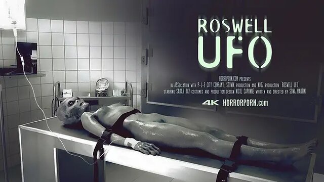 Skinny girl in alien bondage gives a horror-themed blowjob